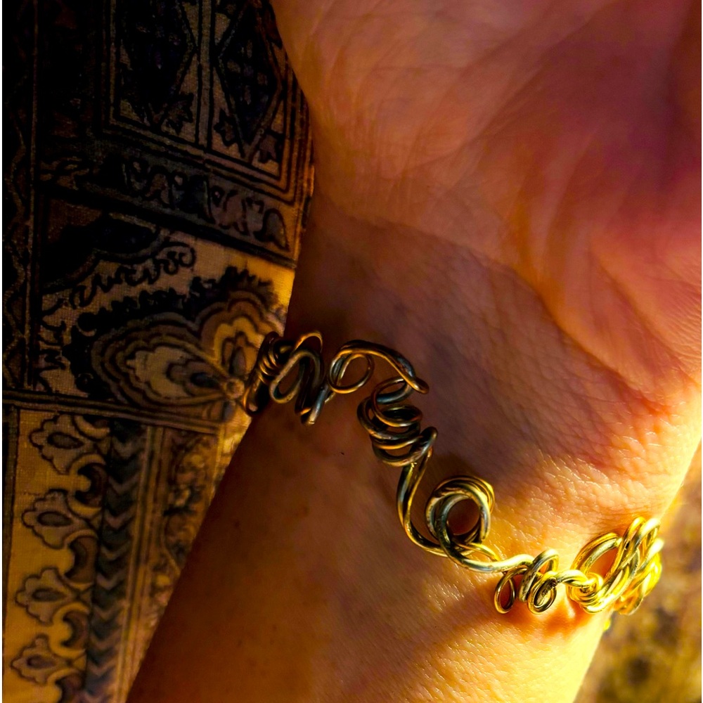 Silver and gold wire bracelet. Very unique!